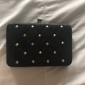 Black studded clutch